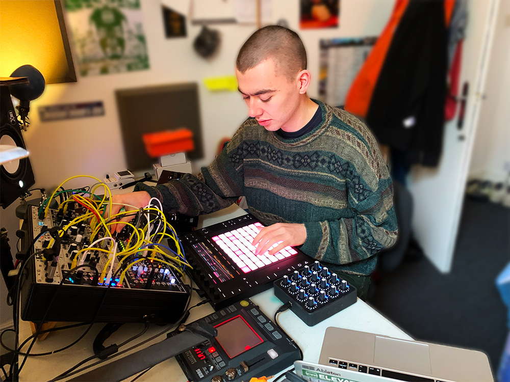 Hamish creating music in his home studio using an Ableton Push 2 and Eurorack